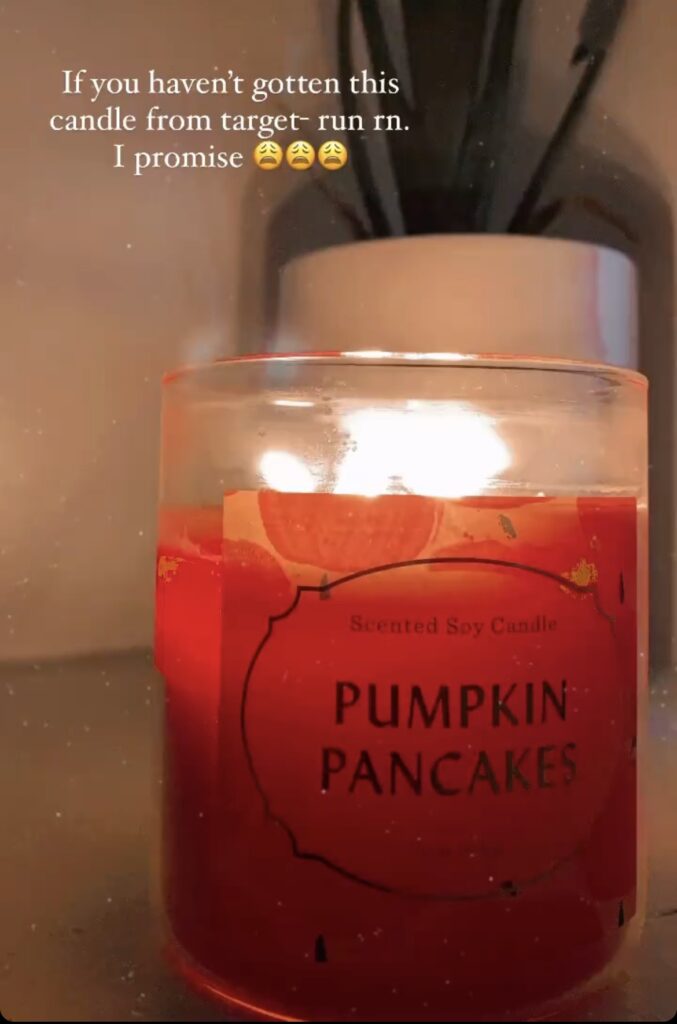 lit orange pumkin pancakes candle